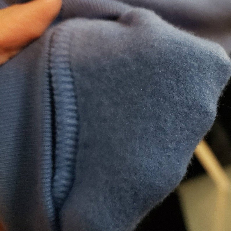 Extremely soft light blue vintage 1990s Christmas winter crewneck sweatshirt.