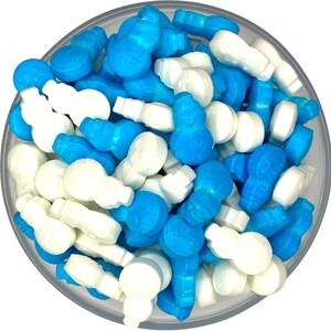 May include: A bowl filled with blue and white snowman-shaped sprinkles. The sprinkles are ideal for decorating cakes, cupcakes, and other desserts.