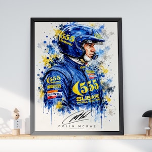 May include: A framed watercolour-style print featuring a portrait of a rally driver wearing a blue helmet and racing suit with yellow 555 Subaru branding, Repsol and Pirelli logos, and the signature and printed name Colin McRae at the bottom.