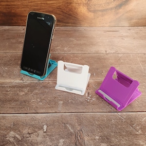 Soporte plegable para teléfono, soporte universal portátil de plástico para teléfono, soporte ajustable para teléfono y tableta, para educación en el hogar, manos libres