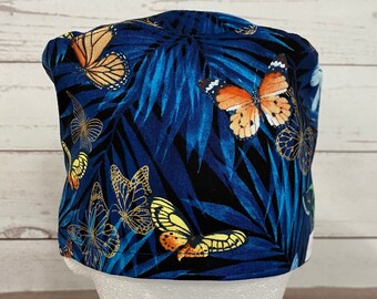 Casquette de gommage médical bleue avec papillons multicolores dorés pour femmes