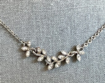 Nolan Miller’s Silver-tone 20” Petite Leaf Necklace Features a  Chain Link Necklace and Centered Elegant Rhinestone Leaves