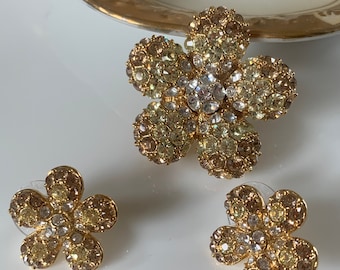 Nolan Miller Gold-tone Brooch  or Pendant with  Pierced Earrings Both Embellished with Pave’ Crystals of Clear, Light Green and Champagne