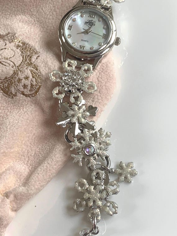 Kirks Folly Bracelet Wristwatch With Snowflakes and Aurora