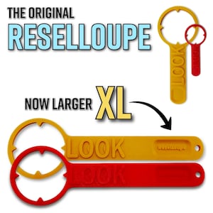 May include: The Original Reselloupe, now larger XL, in yellow and red. The yellow Reselloupe has the word "LOOK" on the handle. The red Reselloupe also has the word "LOOK" on the handle. The text "Reselloupe" is on the yellow Reselloupe handle.