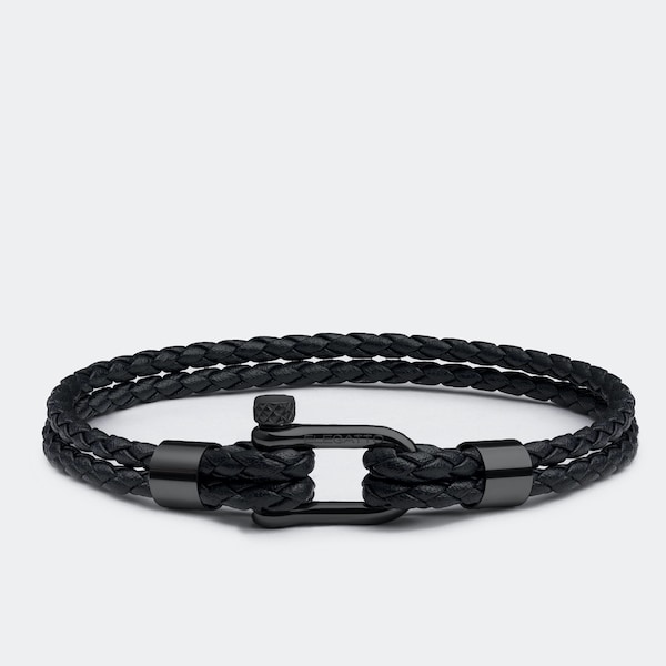 Pulsera de cuero negro trenzado con grillete de acero inoxidable, joyería unisex para motociclistas
