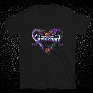 May include: Black t-shirt with a graphic print of a purple and green snake and flower design. The text "Girlschool" is printed in purple and white.