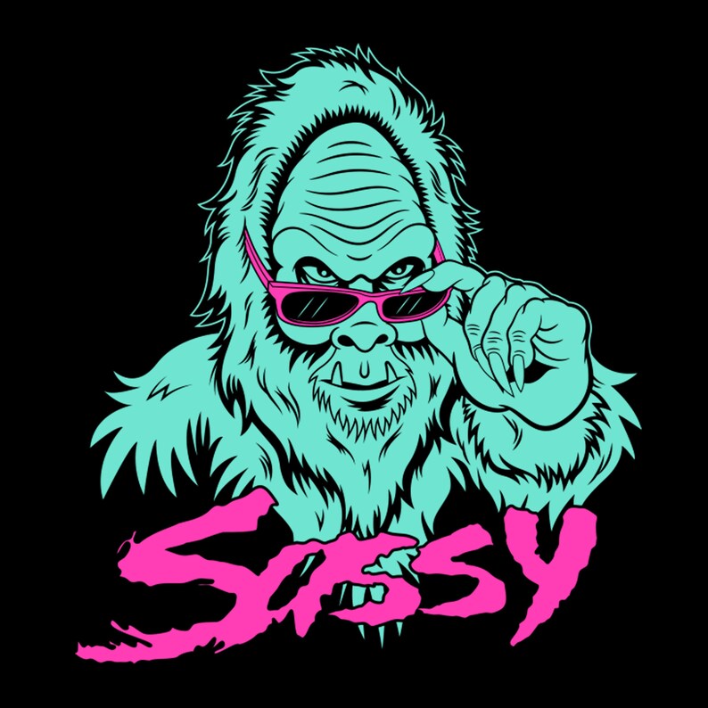 May include: A teal blue Bigfoot with pink sunglasses and a sassy expression. The text "SASSY" is written in pink below the Bigfoot.