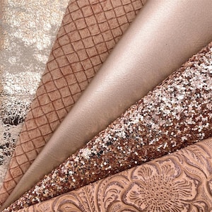 May include: A selection of rose gold and tan textured materials. The textures include a metallic foil, a woven pattern, smooth leather, glitter, and a floral embossed design. These materials are suitable for crafting and design projects.