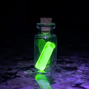 Uranium glass rod in a bottle