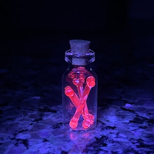 One bottle of borosilicate UV micro bones( Electric Flamingo)(hot pink/red)