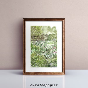 May include: A watercolor painting of a garden scene with a wooden fence, green foliage, and pink flowers. The painting is framed in a brown wooden frame.