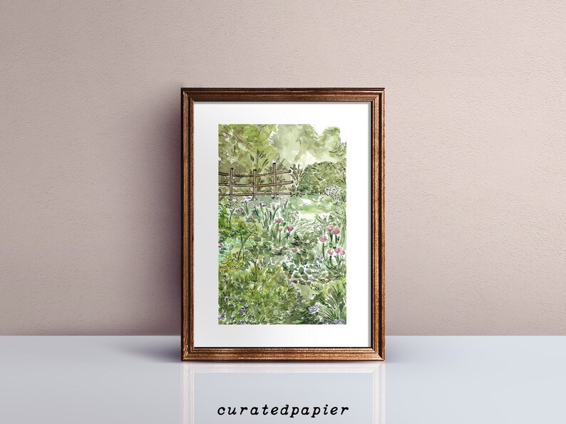 May include: A watercolor painting of a garden scene with a wooden fence, green foliage, and pink flowers. The painting is framed in a brown wooden frame.