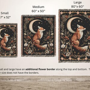 May include: A woven tapestry depicting a fox sitting beneath a crescent moon with stars. The tapestry has a black background with floral details in shades of brown, cream, and pink. The tapestry is available in three sizes: 37 inches by 52 inches, 60 inches by 50 inches, and 80 inches by 60 inches.
