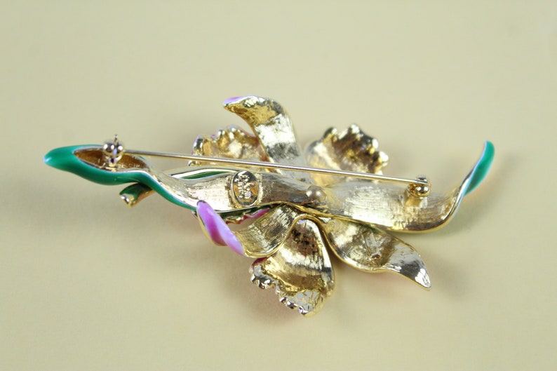 Vintage Joan Rivers enamel and rhinestone floral brooch