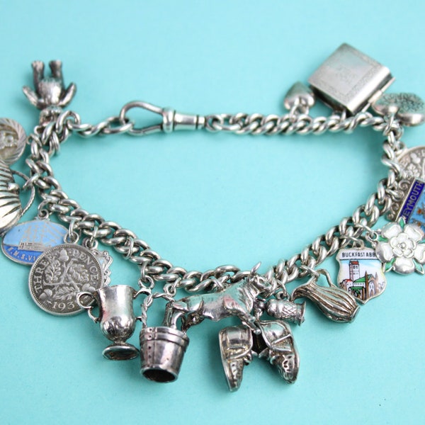 Vintage sterling silver charm bracelet with 20 charms