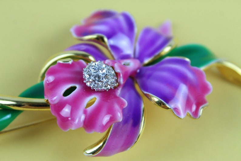 Vintage Joan Rivers enamel and rhinestone floral brooch