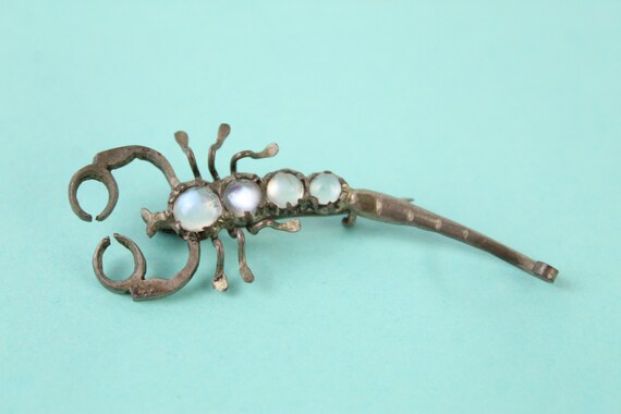 Antique Art Deco moonstone scorpion brooch