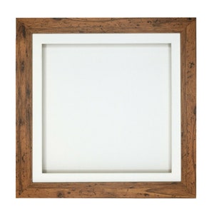 May include: A rustic wooden picture frame with a white mount. The frame has a distressed wood finish and a simple design.