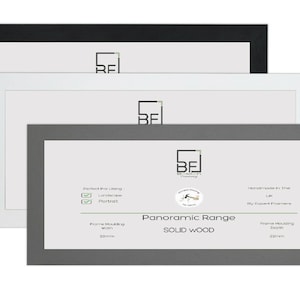 May include: Three picture frames in black, white, and grey. The frames are made of solid wood and have a simple, modern design. The frames are all the same size and have a 22mm depth. The frames are perfect for displaying photos, artwork, or other items.
