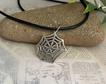 Spiderweb necklace- silver plated charm on 18” black wax cord necklace with 2” extension chain, hypoallergenic