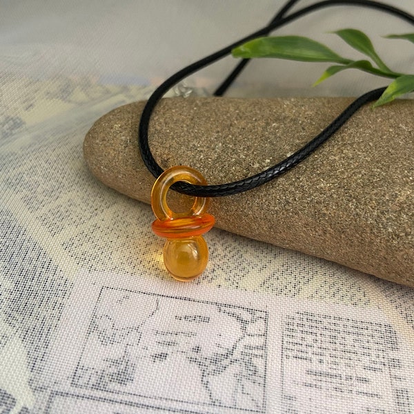 Orange mini pacifier necklace- Plastic transparent pacifier charm on 18” wax cord necklace with 2” extension chain