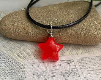 Red star necklace- 90s vibe red plastic star charm on an 18” black wax cord necklace with a 2” extension chain, hypoallergenic
