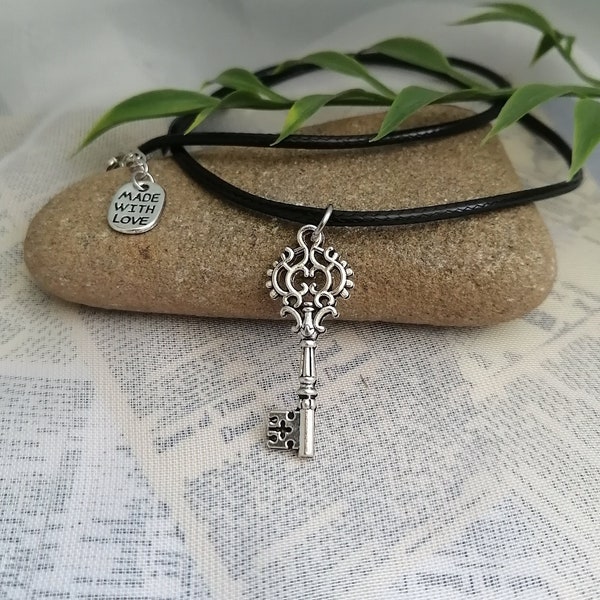 Skeleton key necklace- Silver plated vintage key charm on 18" black wax cord with 2" extension chain, hypoallergenic