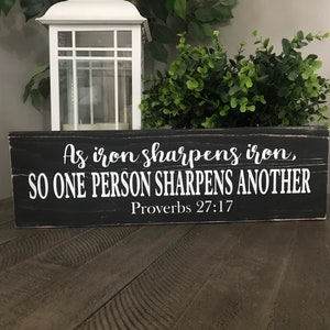 As iron sharpens iron so one person sharpens another wood sign, proverbs 27:17 bible verse sign, scripture sign, white, gray, black