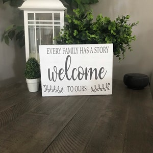 Every family has a story welcome to ours, 10x7.25 inch, distressed, gray, black, white, welcome family sign, family shelf decor, gallery wal
