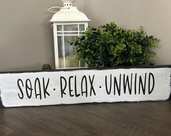 Soak relax unwind long horizontal sign. Choose background and font color