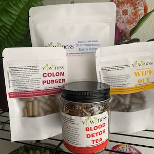 May include: A collection of four different dietary supplement products in white pouches and a glass jar. The pouches contain capsules and the jar contains loose tea. The products are labeled "Colon Purger", "Diatomaceous Earth Detox", "Wipe Out", and "Blood Detox Tea".
