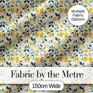 May include: White fabric featuring a pattern of yellow lemons, green leaves, and blue accents. The fabric is labelled "Fabric by the Metre" and is 150cm wide. The image also includes the text "Multiple Fabric Options".
