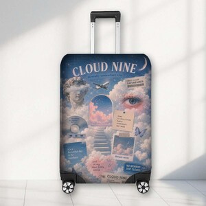 May include: A rolling suitcase featuring a blue and white collage design with clouds, a classical statue head, an aeroplane, a human eye, a staircase, and text including CLOUD NINE, mentally somewhere else, and various other phrases on paper notes.