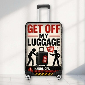 May include: A rolling suitcase with a cream-coloured cover featuring black stick figures and red text that reads GET OFF MY LUGGAGE, BACK OFF, NOT YOURS NOT EVER, HANDS OFF, and RESPECT BOUNDARIES, with a yellow and black hazard stripe at the bottom.