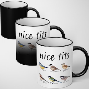 May include: Three ceramic mugs with black handles and rims. The mugs feature the phrase "nice tits" in black script. One mug is solid black. The other two mugs have a white background with illustrations of various birds.