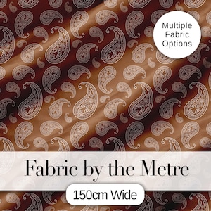 May include: Brown fabric featuring a paisley pattern. The fabric displays a repeating design of white paisley shapes on a brown background. The text "Fabric by the Metre" and "150cm Wide" are displayed. The image also includes the text "Multiple Fabric Options".