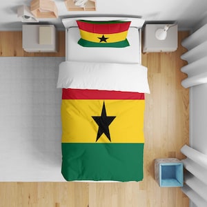 May include: A bed set featuring the flag of Ghana. The bedding includes a duvet cover and pillowcase. The design features horizontal stripes of red, yellow, and green, with a black star in the center of the yellow stripe. The pillowcase has a green stripe at the top.
