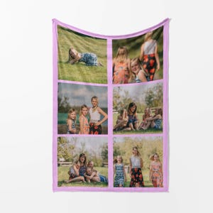 May include: A pink fleece blanket featuring six photographs of a family. The images depict a group of girls, a group of women, and a single girl lying on the grass.