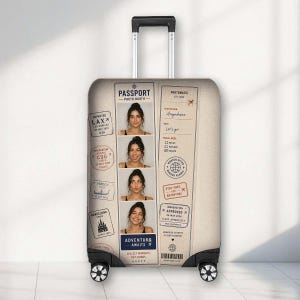 May include: A beige rolling suitcase featuring a passport-themed graphic design. The front displays a vertical photo booth strip of a person, various travel stamps from cities like LAX and Paris, and text including Passport Photo Booth and Adventure Awaits.