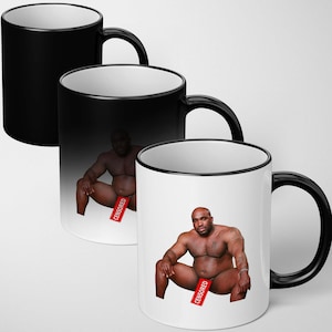 May include: Three ceramic mugs with black handles and rims. The mugs feature a design of a man with a red "CENSORED" label. The mugs are black, black with a white interior, and white with a black rim.