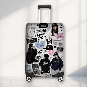 May include: A rolling suitcase featuring a collage-style graphic print in shades of grey, black, and white. The design includes various stickers, text such as Seoul, Youth, and Emis, and photographic images of individuals wearing casual streetwear.