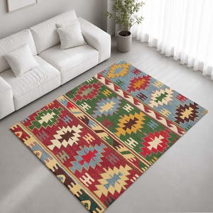 May include: A rectangular area rug featuring a repeating geometric pattern in vibrant shades of red, green, blue, yellow, and brown. The design consists of horizontal bands filled with intricate diamond and stepped motifs across the entire surface.