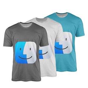 May include: Three t-shirts in grey, white, and turquoise. Each shirt features a large, smiling face graphic in blue and white. The design is a stylized, abstract representation of a face. The shirts are short-sleeved and have a crew neck.