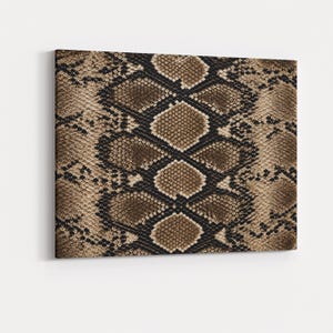May include: A rectangular canvas print featuring a detailed, high-resolution pattern of brown and black snakeskin. The design displays a repeating, diamond-shaped scale texture in shades of tan, beige, and dark brown, creating a realistic reptilian skin effect across the entire surface of the artwork.