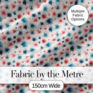 May include: White fabric featuring a pattern of red, blue, and black starbursts. The text "Fabric by the Metre" is displayed, along with "150cm Wide" and "Multiple Fabric Options". The fabric is 150cm wide.