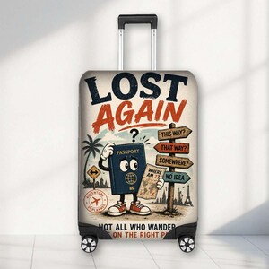 May include: A rolling suitcase with a graphic print featuring a cartoon passport character holding a map. The text reads LOST AGAIN, THIS WAY, THAT WAY, SOMEWHERE, NO IDEA, WHERE AM I, ADVENTURE UNPLANNED, and NOT ALL WHO WANDER ARE ON THE RIGHT PATH.