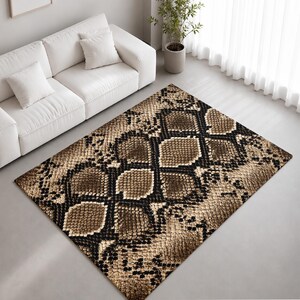 May include: A rectangular area rug featuring a detailed, repeating snakeskin pattern in shades of brown, tan, and black. The design mimics the texture and scale arrangement of a snake, creating a high-contrast, organic visual effect across the surface.