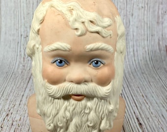 Santa Doll Head Pink Stocking Caps with Star Design and Holly Detail Vintage Santa Head with Cotton Fluff Beard and Wire Rimmed Spectacles