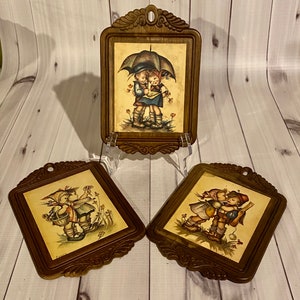 Trio of Evans Wall Plaques